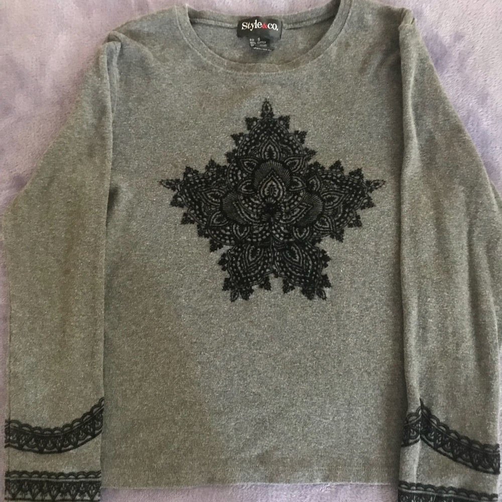 Woman’s Sweater (small). Has beautiful stitching
